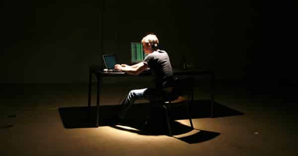 Hacker in shadows