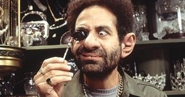 Men in black pawn shop owner