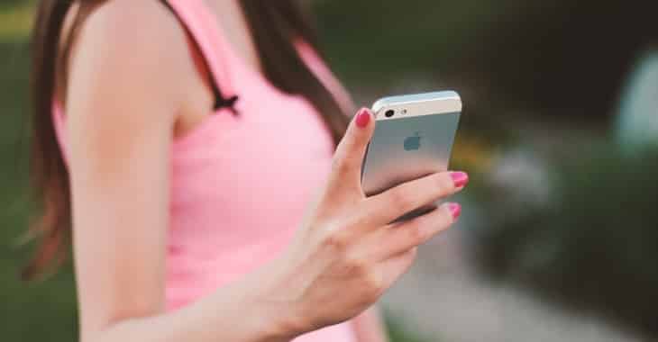 Holding iphone